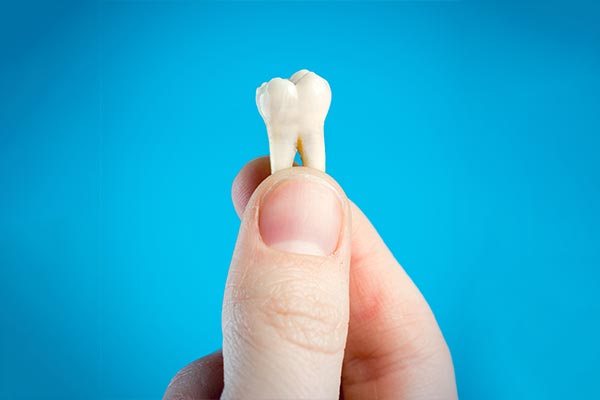 A General Dentist Helps You Decide Whether To Pull or Save a Tooth from Unique Family Dentistry in Elizabeth, NJ